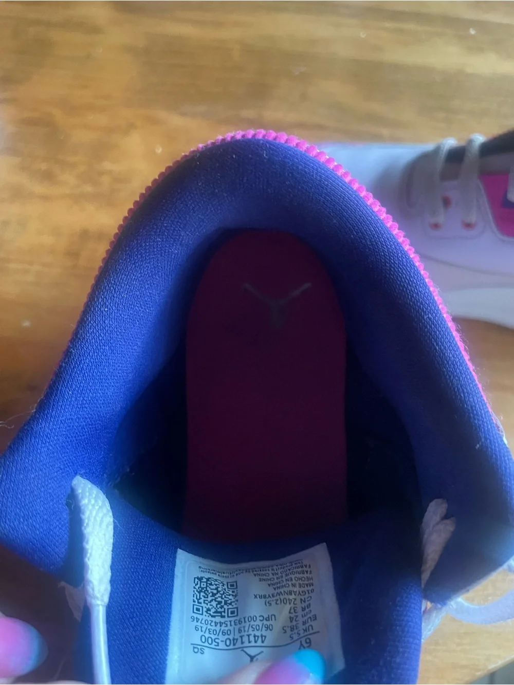 Nike Kids White Sneakers with Pink and Purple Accents